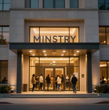 A cinematic shot of a modern ministry building entrance at dusk, with warm golden light spilling out, welcoming people to a global movement of faith.
