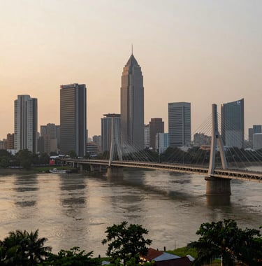 A scenic wide shot of the Patna city skyline at dawn, capturing the bridge over the Ganges with a soft sand beige and dark forest green color palette, emphasizing the regional importance of the Dharma Group headquarters.