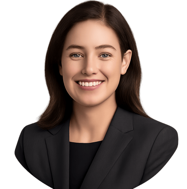 Professional circular portrait of a smiling woman in a dark business suit.