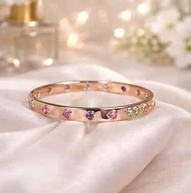 rainbow sapphire heart bangle in 18k rose gold