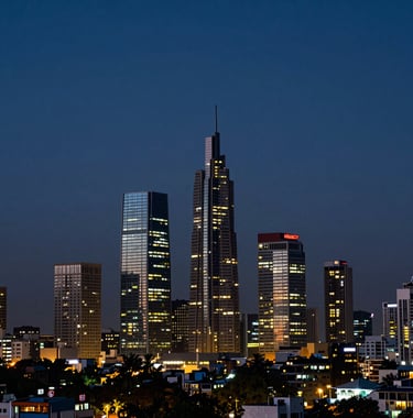 Cinematic photography of the Mumbai skyline at dusk, with city lights beginning to glow against a deep navy blue sky. The composition is professional and modern, highlighting the agency's local roots in Bandra East.