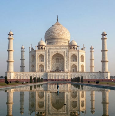 A breathtaking photograph of the Taj Mahal in Agra at sunrise, reflecting in the water. The image uses soft blue and white light to convey inspiration and the beauty of domestic travel in India.