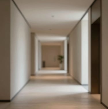 A minimalist architectural shot of a luxury hotel corridor with soft, natural lighting and a muted travel-inspired color palette.