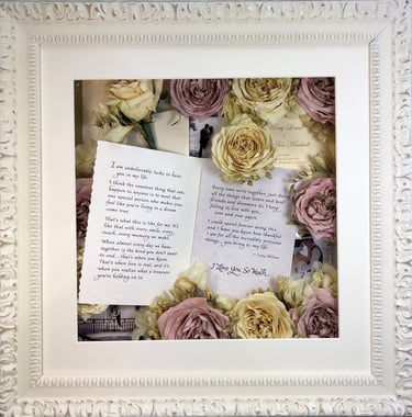 memory box full of preserved wedding flowers, order of service and buttonhole
