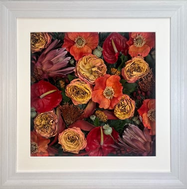 a bright flower wall style preserved wedding bouquet in a frame