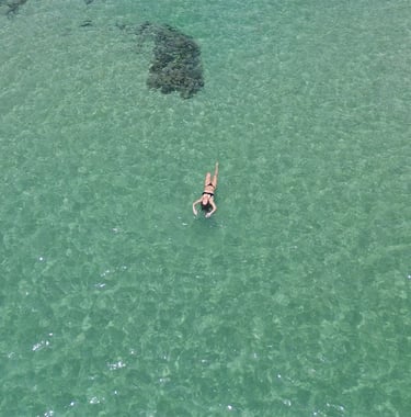 Floating over Paunch Beach