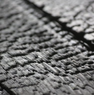 Sugi ban, a Japanese wood charring technique, combines sustainability and style. By charring the woo