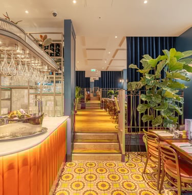 a restaurant with a bar and table
