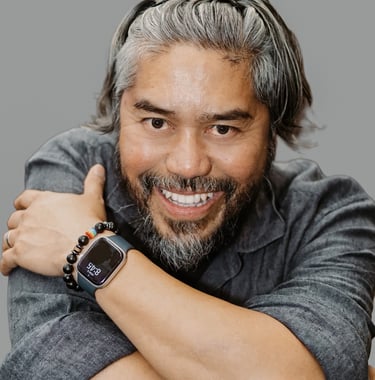 A man Director Roman Berry with a watch on his wrist