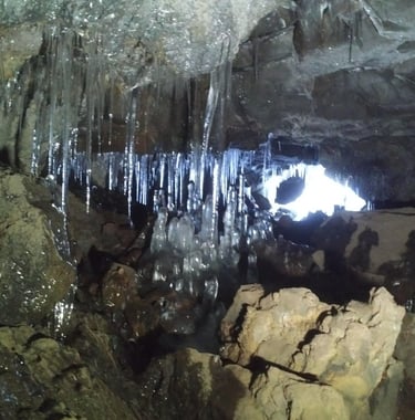 a cave with a small window 