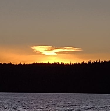 a sunset over a lake