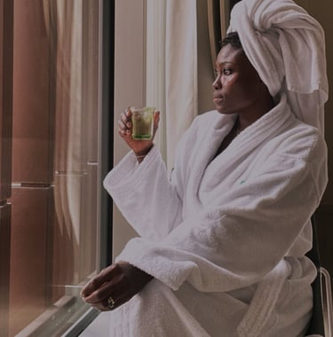 A lady sitting and enjoy a self care moment