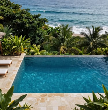 Top-down view of a luxury infinity pool overlooking the ocean in Costa Rica. The water is a deep crystalline blue, surrounded by Warm Cream tiles and lush Deep Forest Green tropical plants. High-end lifestyle photography.