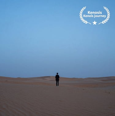 A solitary person standing in a vast, quiet desert landscape during the blue hour. The horizon is a clean line of slate blue meeting a mist blue sky. The composition is minimalist, emphasizing the 'emptiness' and peace of the Kenosis journey.