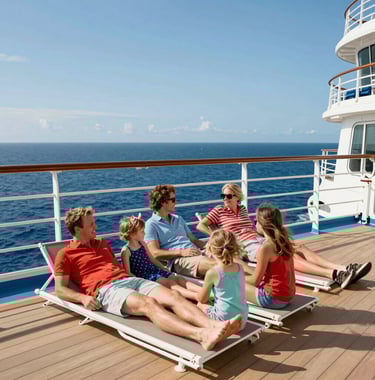 A candid shot of a happy family relaxing on a luxury cruise ship deck under the bright sun, wearing North American summer attire, overlooking a vibrant sky blue ocean.