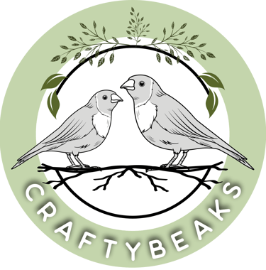 craftybeaks 2 gouldian finches within a green circle