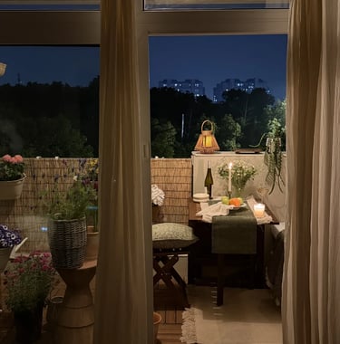 Cozy balcony with warm ambient lighting and natural wooden textures, inspired by warm European outdoor living