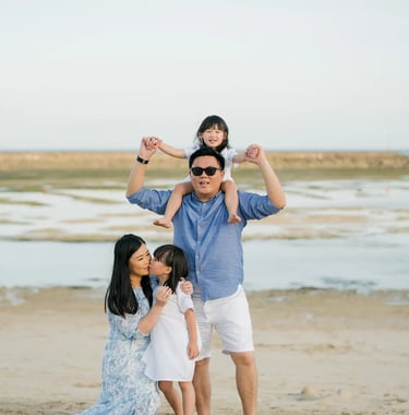 Lifestyle family photography on the beach at The Apurva Kempinski Bali