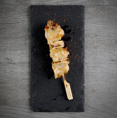 a skewer of chicken thigh ang green onion negima