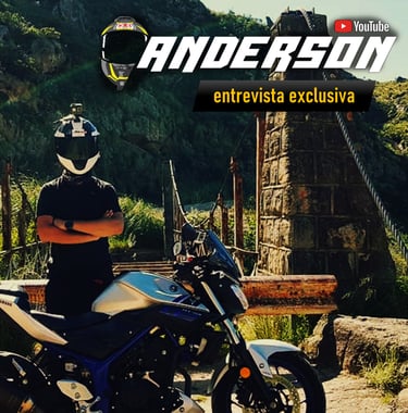a man in a helmet and a helmet on a motorcycle