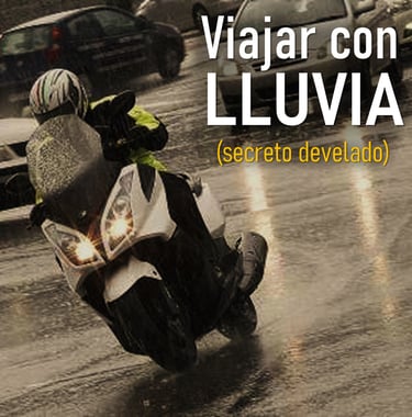 a person riding a motorcycle in the rain