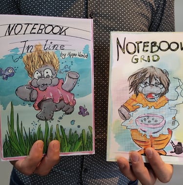 a person holding a notebook with a notebook and notebook