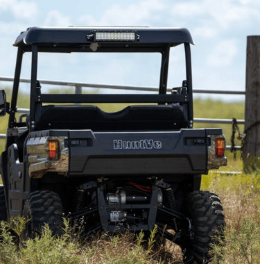 huntve utv parked outside a gate