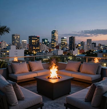 Evening shot of a terrace with outdoor fire pit and comfortable seating, overlooking the lights of a major Latin American city.