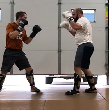 Two men Kickboxing 