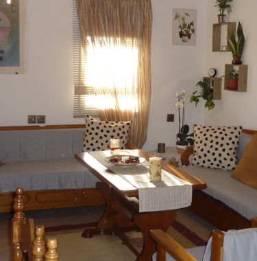 a living room with a couch and a table