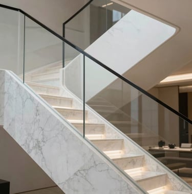 Modern architectural detail of a staircase in a luxury home. Pure white marble and glass railings, soft lighting, sophisticated interior photography.