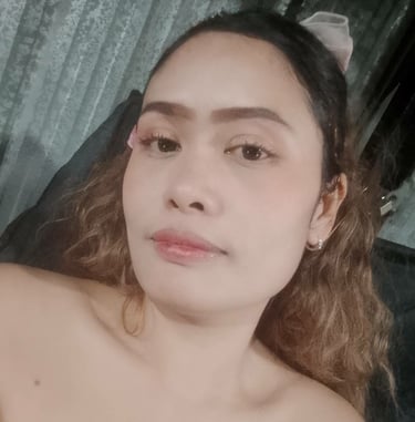 Head and shoulder photo of lady in black dress