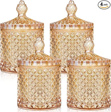 Set of four amber glass jars with lids featuring a vintage diamond-cut design