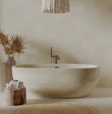 Banheiro sofisticado com duas cubas de apoio, espelhos redondos e revestimentos naturais em projeto