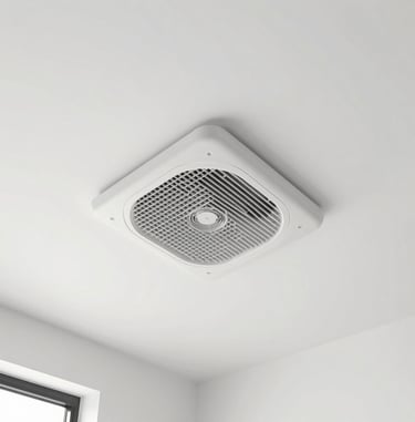 An outdoor air source heat pump unit installed on a white wall of a modern residential home.