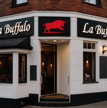 Premium illuminated restaurant signage design for La Buffalo featuring modern outdoor branding and luxury facade advertising.