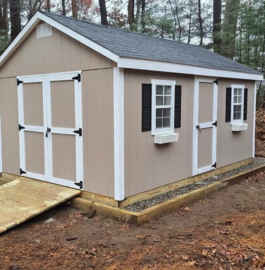 Custom 10x16 wooden shed built in Hingham, Massachusetts for versatile outdoor storage.