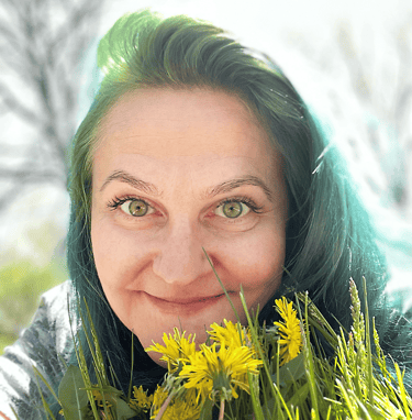 a woman with green hair and yellow flowers