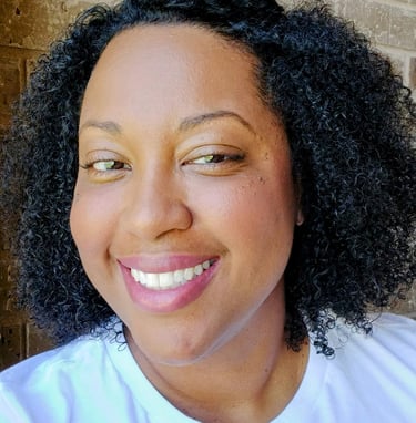 a woman with a white shirt and black hair