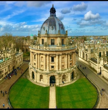 a large building with a dome shaped building in the middle of it
