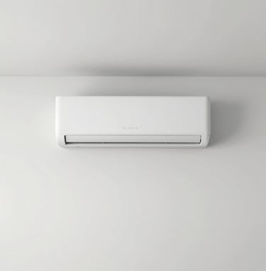 An outdoor air source heat pump unit installed on a white wall of a modern residential home.