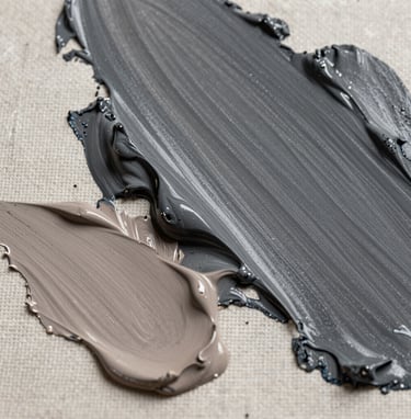 Close-up macro photography of charcoal grey and taupe oil paint textures on a linen canvas. The light is soft and directional, highlighting the organic peaks of the medium. North American contemporary style.