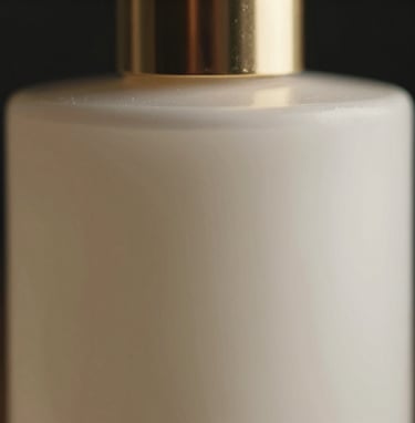 A macro shot of a high-end luxury product, such as a designer perfume bottle, with dramatic cinematic lighting. The background is deep black, highlighting the soft off-white glass and muted gold metallic accents.