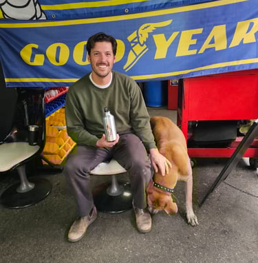 Happy customer with dog after tire installation at Fast Tire Shop East Los Angeles