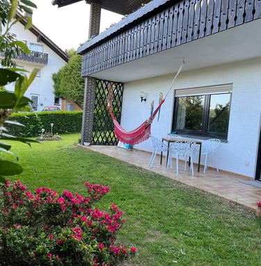 a hammock hanging in a garden