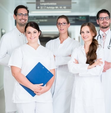 a group of doctors and nurses in white coats and lab coats