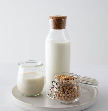 Image by <a href="https://www.freepik.com/free-photo/milk-day-concept-with-chickpeas-arrangement_265