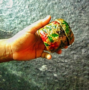 Mini recycled paper trinket box held with hand 