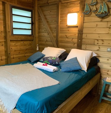 Une chambre avec lit Queen size