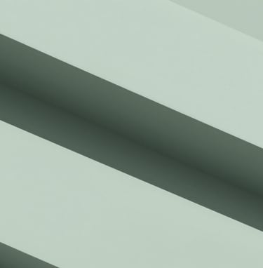 An abstract architectural detail featuring clean lines and muted sage green (#A0A696) tones. The composition is minimalist and balanced, symbolizing the structured and creative approach to building visual identities.